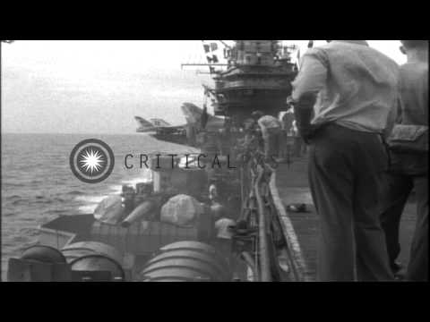Crew battles fire aboard the Carrier USS Oriskany (CVA-34), off Vietnam HD Stock Footage