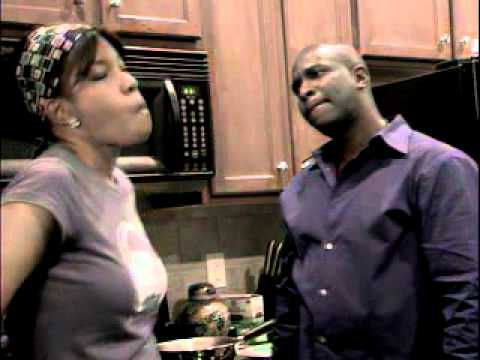 Man beating his wife in the kitchen caught on tape.